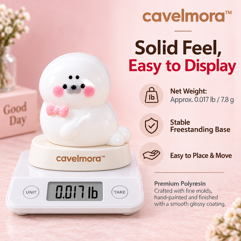 Cavelmora™White Seal With Pink Bowtie Figurine